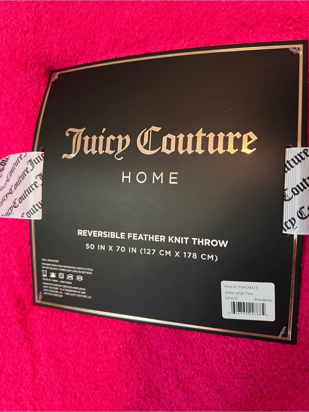Juicy Couture Reversible Feather Knit Throw in Bright Pink with White Logo